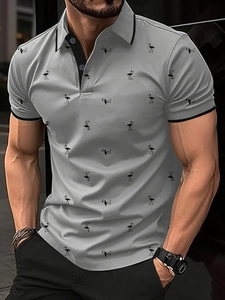 Detail of grey men's slim fit Polo shirt featuring all-over black flamingo print