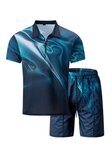 Detail of teal abstract 3D print on men's zipper polo shirt and drawstring shorts
