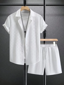 Close-up of white men's summer set featuring textured geometric jacquard fabric details