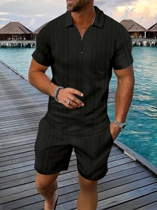 Detail of black vertical diamond textured fabric on men's summer zipper polo shirt set