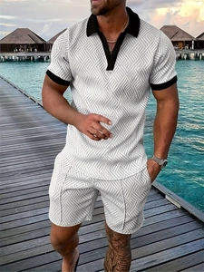 Detail of men's summer polo set with textured geometric knit and black contrast collar