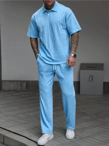 Detail of light blue men's polo set featuring vertical textured knit fabric
