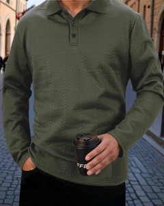 Close-up of olive green knit texture and buttoned polo collar on men's long sleeve shirt