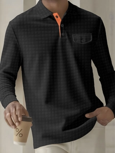 Detailed view of men's waffle knit long sleeve polo shirt with chest pocket and contrast collar