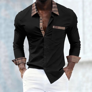 Detail of contrast plaid stitching on the collar and pocket of a black men's shirt
