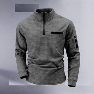 Men's quarter-zip polo shirt in dark grey waffle knit fabric with a sleeve zipper pocket