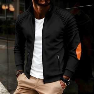 Detailed shot of men's slim jacket with arm pleats and orange elbow patch detail