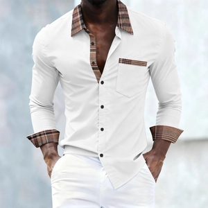 Detail of men's white slim shirt featuring classic plaid patchwork on collar and cuffs