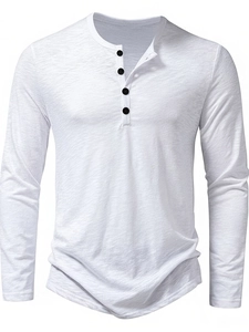 Detailed close-up of white slub cotton Henley shirt showing four-button placket and texture