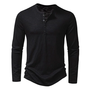 Detail of black long-sleeved Henley shirt showing the four-button collar and soft knit fabric