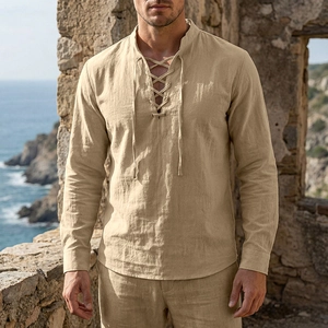 Detail of men's vintage linen shirt showing cross-lace V-neck and khaki cotton texture