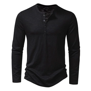 Men's slim fit black long sleeve Henley shirt with textured fabric and three-button collar