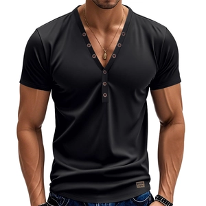 Detail view of the V-neck henley collar featuring bronze metal buttons on black short sleeve tee