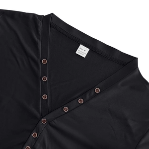 Detailed close-up of a men's black Henley shirt neckline with V-neck buttons and M size label