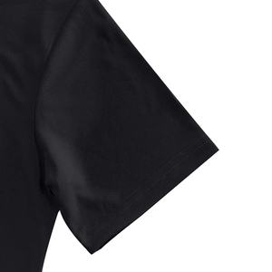Detail of double-needle stitching on the black Henley shirt sleeve cuff with texture