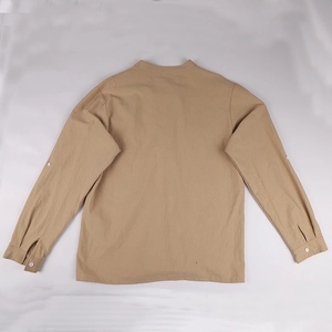 Detail of khaki linen Henley shirt showing back view and adjustable roll-up sleeves