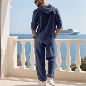 Men's navy linen leisure set featuring hooded long sleeve shirt and trousers for beach vacations