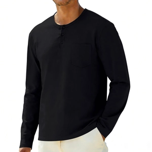 Close-up detail of a men's black long-sleeve Henley shirt with chest pocket and buttons