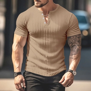 Detail of men's slim fit apricot henley shirt showing ribbed knit texture and buttoned neck