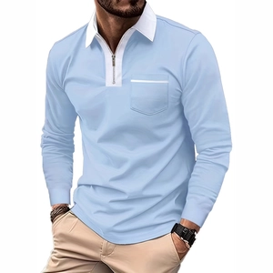 Detail of light blue long sleeve polo shirt with white contrast collar and quarter zip