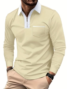 Close-up of contrast polo collar with metal zipper and pocket detail on beige shirt