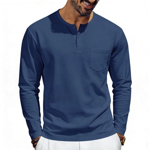 Detail of navy blue Henley shirt featuring a three-button placket and front chest pocket