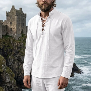 Close-up of retro white linen Henley shirt featuring lace-up collar and medieval style texture