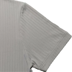 Detail of gray knitted Henley shirt showing shoulder seams and ribbed fabric texture