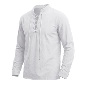 Detailed close-up of white lace-up linen shirt with vintage stand collar and textured fabric