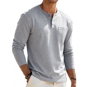 Detail of grey Henley shirt showing soft knit texture, three-button placket and chest pocket