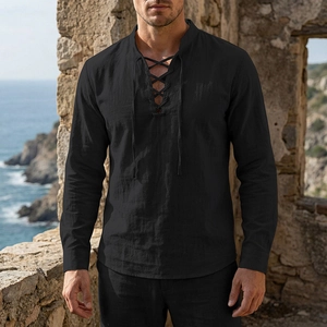 Close-up of black linen lace-up V-neck shirt showing fabric texture and retro style