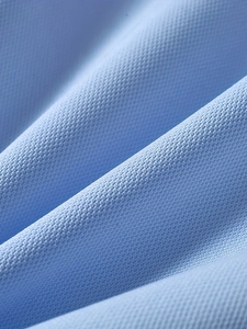Men's slim long-sleeve polo shirt featuring breathable light blue micro-grid fabric texture