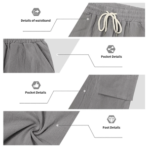 Detail view of linen cargo pants featuring elastic drawstring waist and side flap pockets