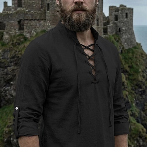 Detail of vintage black linen shirt with lace-up V-neck and stand collar design