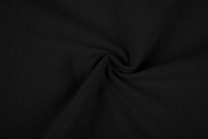 Close-up of black linen fabric texture with soft natural wrinkles and woven detail