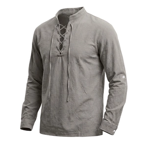 Detail of light grey linen Henley shirt featuring V-neck lace-up and buttoned cuffs