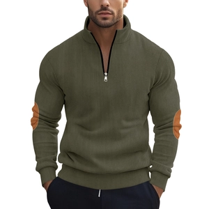 Men's dark green corduroy quarter-zip sweatshirt with stylish brown elbow patches