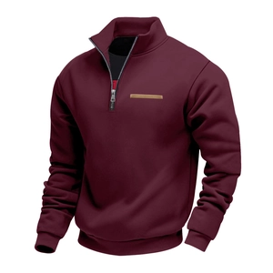 Detail of burgundy men's fleece hoodie with stand collar and silver metal zipper
