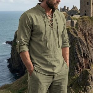 Detail of men's vintage linen shirt set in grass green featuring lace-up collar design