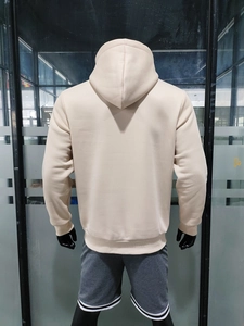 Πίσω όψη μπεζ oversized φούτερ με μισό φερμουάρ και χοντρό βαμβακερό ύφασμα υψηλής ποιότητας