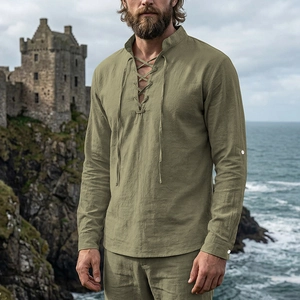Close-up of medieval retro linen shirt with lace-up V-neck and stand collar for men