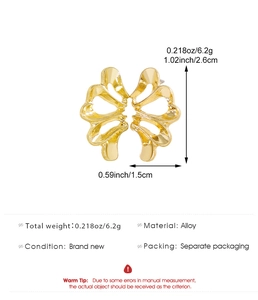 Detailed macro view of gold hollow petal earrings showing exact size dimensions and material specs.