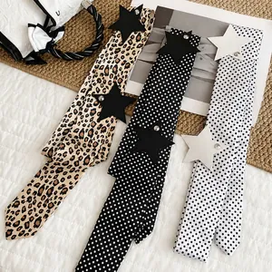 Fashionable Y2K silk polka dot and leopard print waist belts with leather star accents