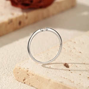 Minimalist S925 sterling silver ring for women featuring a dainty moissanite stone accent