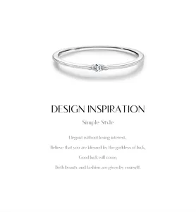 Detail of minimalist S925 silver ring featuring a sparkling marquise moissanite