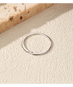 High-quality macro view of a minimalist S925 silver ring featuring a marquise-cut stone