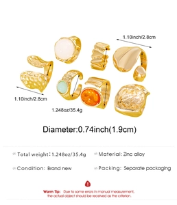 Detail view showing dimensions and weight of gold vintage irregular ring set.