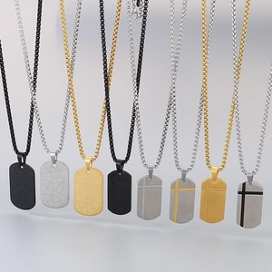 Men's stainless steel dog tag cross pendant necklaces with geometric line patterns.