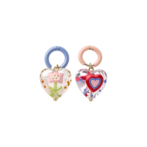 Vibrant and colorful enamel glass heart and flower hoop earrings in a sweet dopamine style