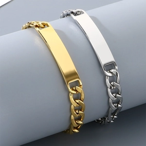 Detailed view of minimalist gold and silver polished bar curb chain titanium bracelets
